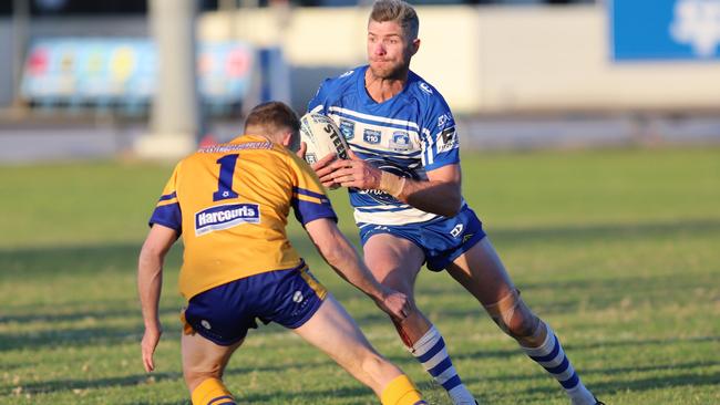 Jarrod Boyle taking a run for the Thirroul Butchers. Picture: Steve Montgomery