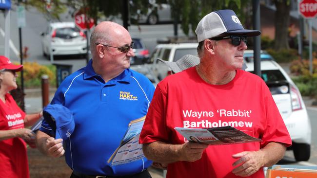 Prepoll voting opened Monday morning and the crowd flocked to  Burleigh prepoll boothto cast their vote. Candidate Wayne Bartholomew (ALP) and sitting member Michael Hart (Liberal)were there handing out how to vote cards.. Picture Glenn Hampson