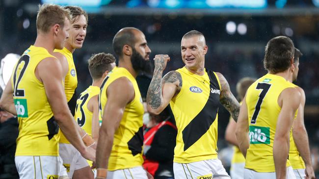 Dustin Martin shares a laugh with his teammates.