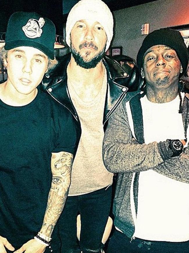 Lentz with Justin Bieber and rapper Lil Wayne.