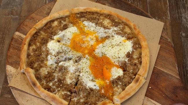 The egg-splattered awarma manousheh. Picture: Robert Pozo