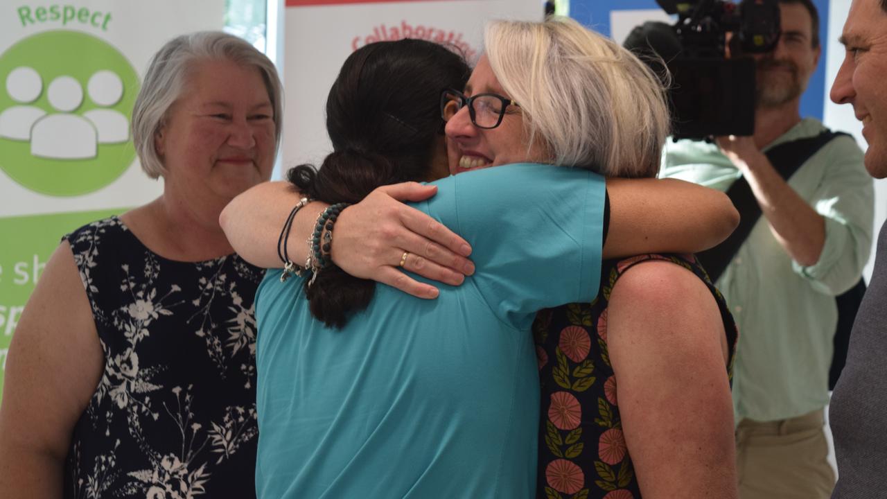 Cid Harbour shark attack survivor Justine Barwick embraces Dr Tina Moriaty, who held her hand as she was being wheeled in to theatre.