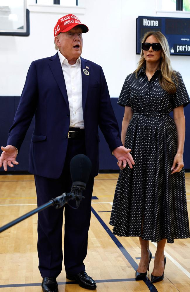 Donald Trump and Melania Trump after casting their votes at the polling place in the Morton and Barbara Mandel Recreation Centre on election day in Palm Beach, Florida. Picture: Getty Images via AFP