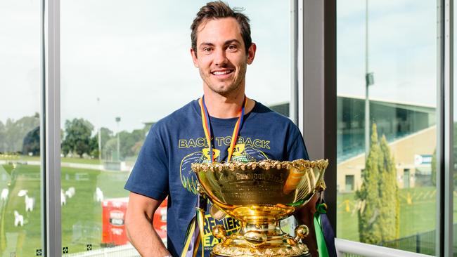 Daniel Menzel holding the cup at the Eagles SANFL grand final celebrations in 2021. Picture: Morgan Sette