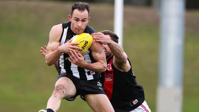 Jaye Bowden marks in front of North Launceston’s Corey Nankervis at KGV. Picture: NIKKI DAVIS-JONES