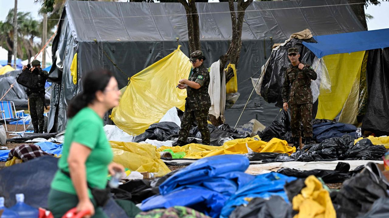 Soldiers dismantle the camp set up by supporters of Brazil's ex-president Jair Bolsonaro in front of the Army headquarters in Brasilia. Picture: AFP