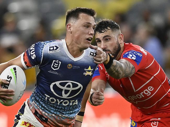 TOWNSVILLE, AUSTRALIA - JUNE 10:  Scott Drinkwater of the Cowboys attempts to get past Jack Bird of the Dragons during the round 14 NRL match between the North Queensland Cowboys and the St George Illawarra Dragons at Qld Country Bank Stadium, on June 10, 2022, in Townsville, Australia. (Photo by Ian Hitchcock/Getty Images)