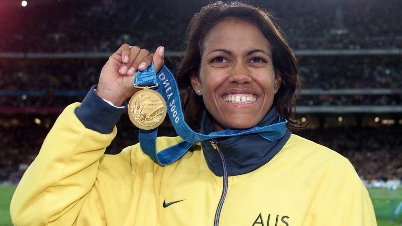 Cathy Freeman with her 400m gold medal at the 2000 Sydney Olympic Games. Picture: Craig Borrow