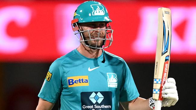 BRISBANE, AUSTRALIA - DECEMBER 27: Chris Lynn of the Heat celebrates his half century during the Men's Big Bash League match between the Brisbane Heat and the Melbourne Stars at The Gabba, on December 27, 2021, in Brisbane, Australia. (Photo by Bradley Kanaris/Getty Images)