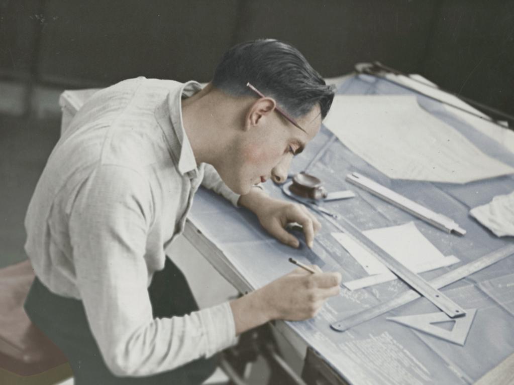 A draughtsman works in the development department at Holden’s Motor Body Builders factory in Woodville.