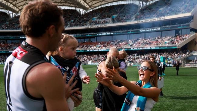 Jeremy Finlayson of the Power with wife Kellie and daughter Sophia: (Photo by James Elsby/AFL Photos via Getty Images)