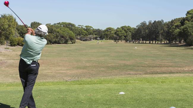 A Botany Golf Club member playing the course.