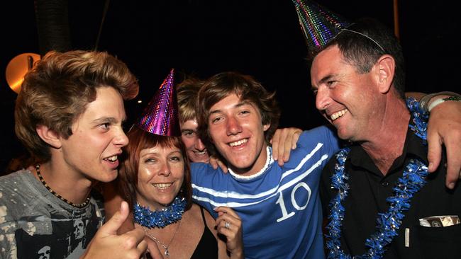 Jan and Damian Bathersby and children that forced their way into the photo celebrate New Year’s Eve in 2005. Picture: Brett Wortman