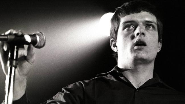 Joy Division, Ian Curtis performing live onstage at the Lantaren. Photo by Rob Verhorst/Getty Images