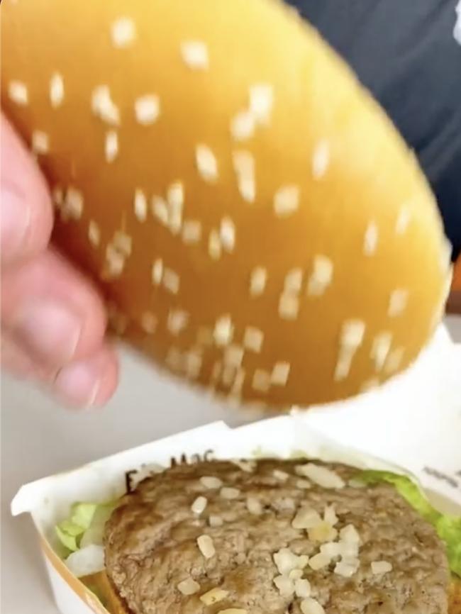 Jonathan Massaad said the best way to eat a Big Mac was to get rid of the top bun. Picture: TikTok/Cake Mail.