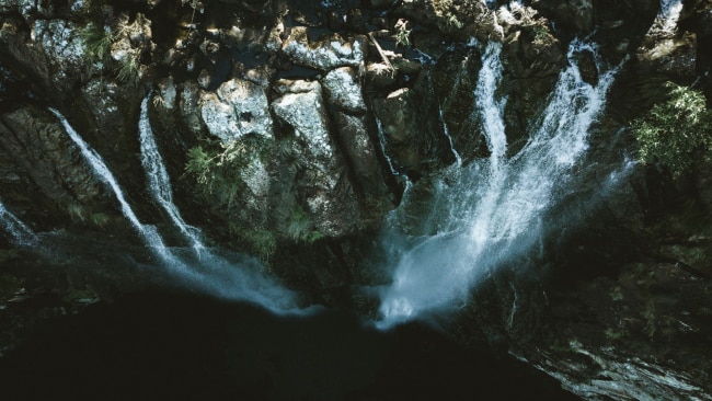 Aerial overlooking Minyon Falls in Nightcap National Park, Whian Whian. Picture: Destination NSW