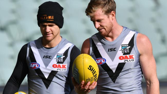 Robbie Gray (left) with Port Adelaide teammate Tom Jonas — who has become a surprise SuperCoach star himself this season.