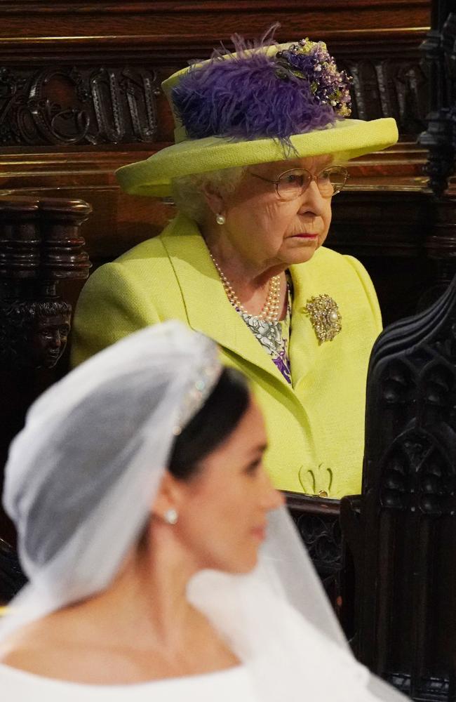 Queen Elizabeth II looks stony-faced during Bishop Curry’s sermon. Picture: Jonathan Brady — WPA Pool/Getty Images