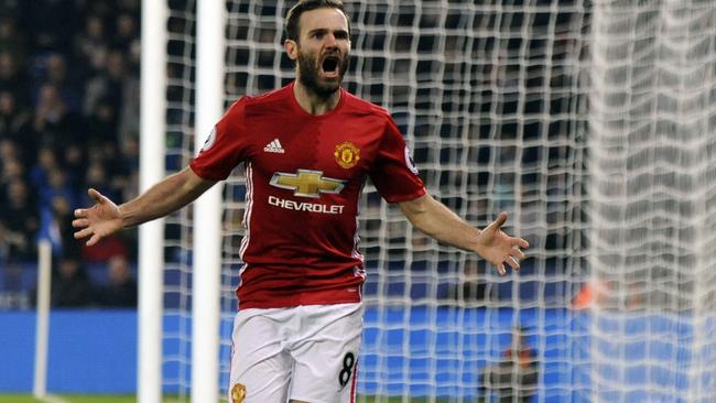Manchester United's Juan Mata celebrates.