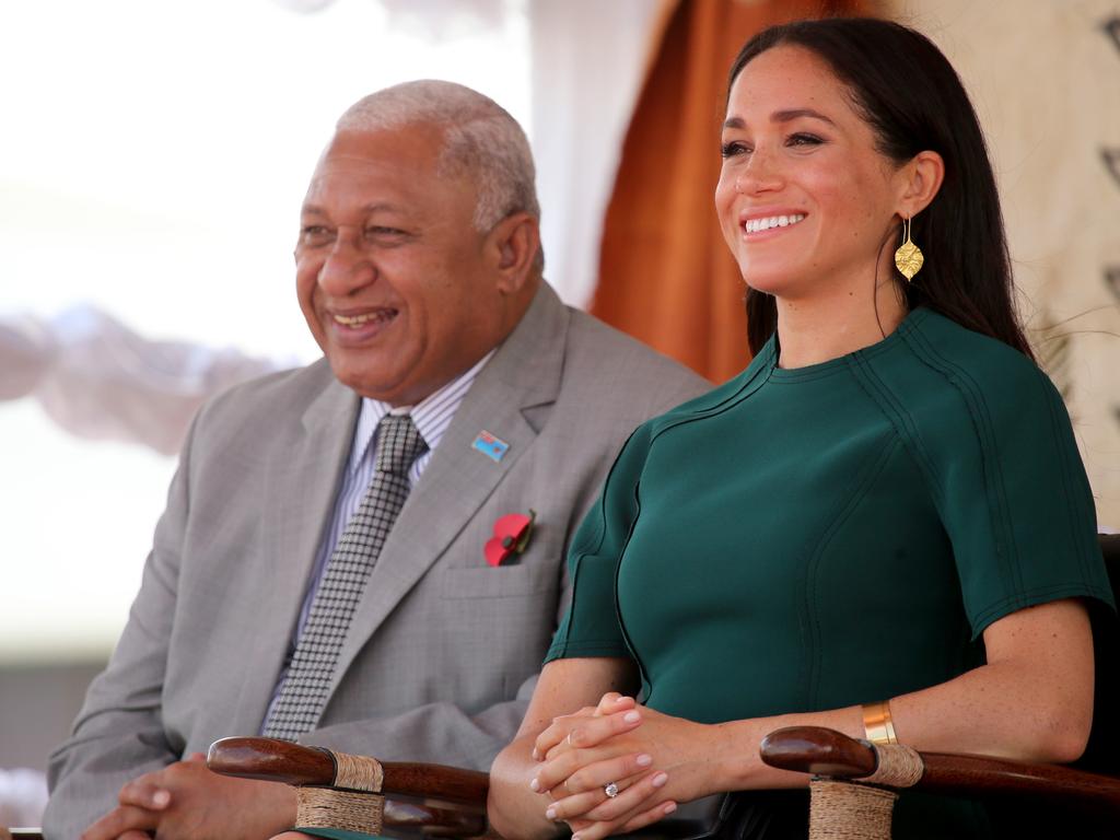 The Duke and Duchess of Sussex Prince Harry and Meghan take part in a traditional fijian ceremony at Nadi Airport in Fiji to . Picture: Nathan Edwards