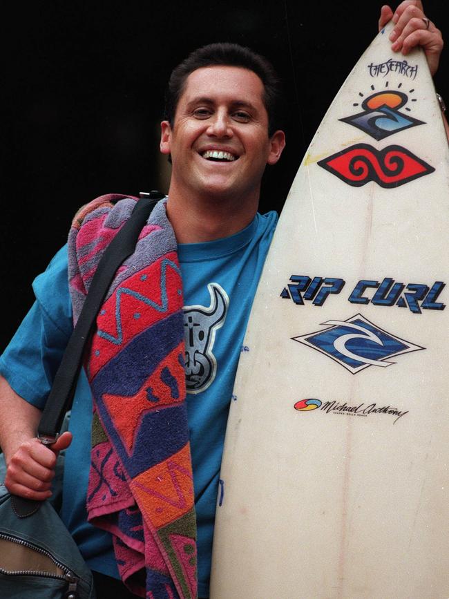 Larry Emdur prepares to hit the surf in his younger days.