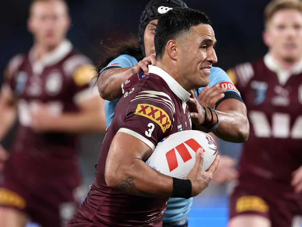 SYDNEY, AUSTRALIA – JUNE 05: Valentine Holmes of the Maroons is tackled during game one of the 2024 Men's State of Origin Series between New South Wales Blues and Queensland Maroons at Accor Stadium on June 05, 2024 in Sydney, Australia. (Photo by Cameron Spencer/Getty Images)