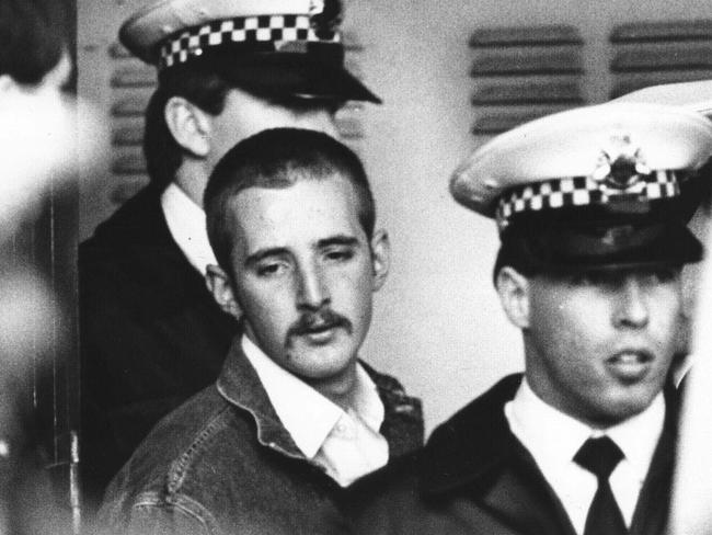 Under heavy police guard, Julian Knight, 19, who shot dead 7 people and wounded 19 in Hoddle Street, Clifton Hill. Hoddle St massacre. Pic Michael Potter