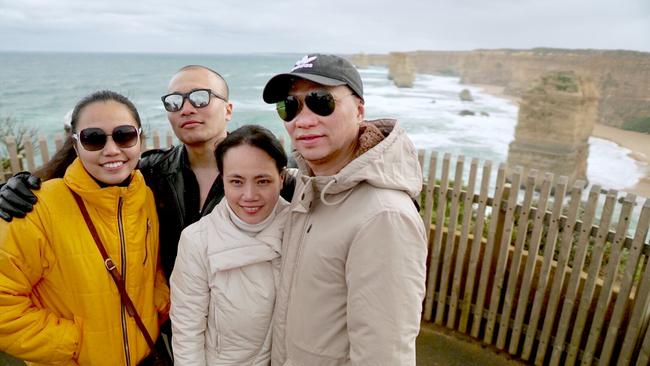 Thu Anh Tran Le, Khoa Tran Le, Trinh Mong Thi and Sang Van Le at the Twelve Apostles on the Great Ocean Road. Picture: Supplied