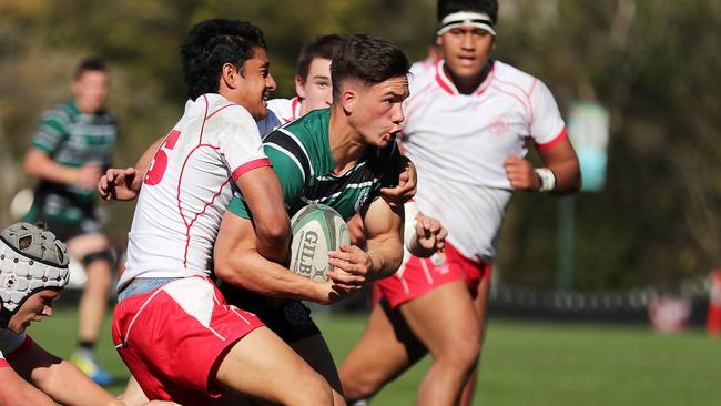 Jack Howarth tries to break through the Ipswich Grammar defence last year. Picture: AAP Image/Josh Woning