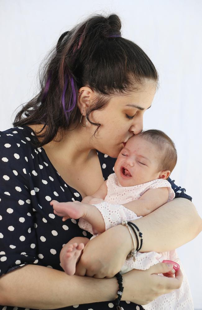 Katie Callipolitis and her miracle baby Evangeline. Picture: Annette Dew.