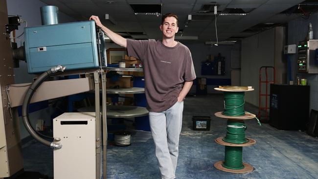 The old Grafton Street cinemas is about to be reborn - as the new home of Calvary Church. Calvary’s Cairns campus pastor Josh Douglas, pictured in the old projector room, is set to lead his first service in the converted venue on February 20. Picture: Brendan Radke