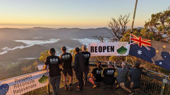 In the early hours of Australia Day morning, climbing advocate Marc Hendrickx and local Indigenous elder Sturt Boyd climbed Mt Warning with a group of supporters calling for the trail to be reopened to the public.