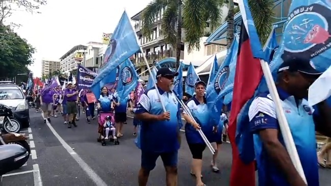 Union members march in Cairns