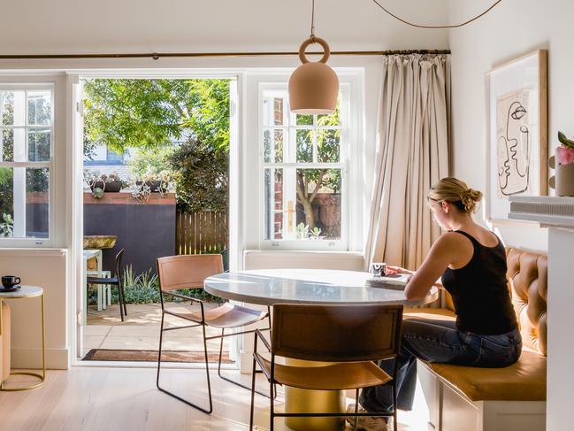 At Home 2023: Heatherly Design founder and director Georgie Leckey applied her design know-how to renovating her small bolthole in Melbourne's Toorak. Her favourite space is the dining nook with banquette. Picture: supplied.