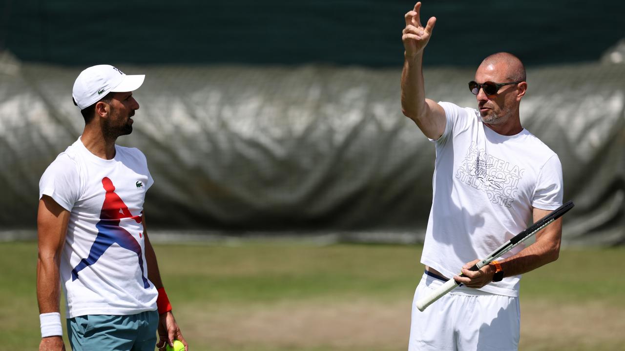 Novak Djokovic getting advice from his coach, Boris Bosnjakovic. Picture: Clive Brunskill/Getty Images