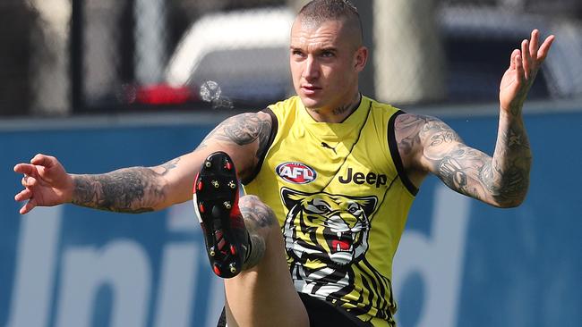 Richmond star Dustin Martin kicks at goal. Pic: Michael Klein