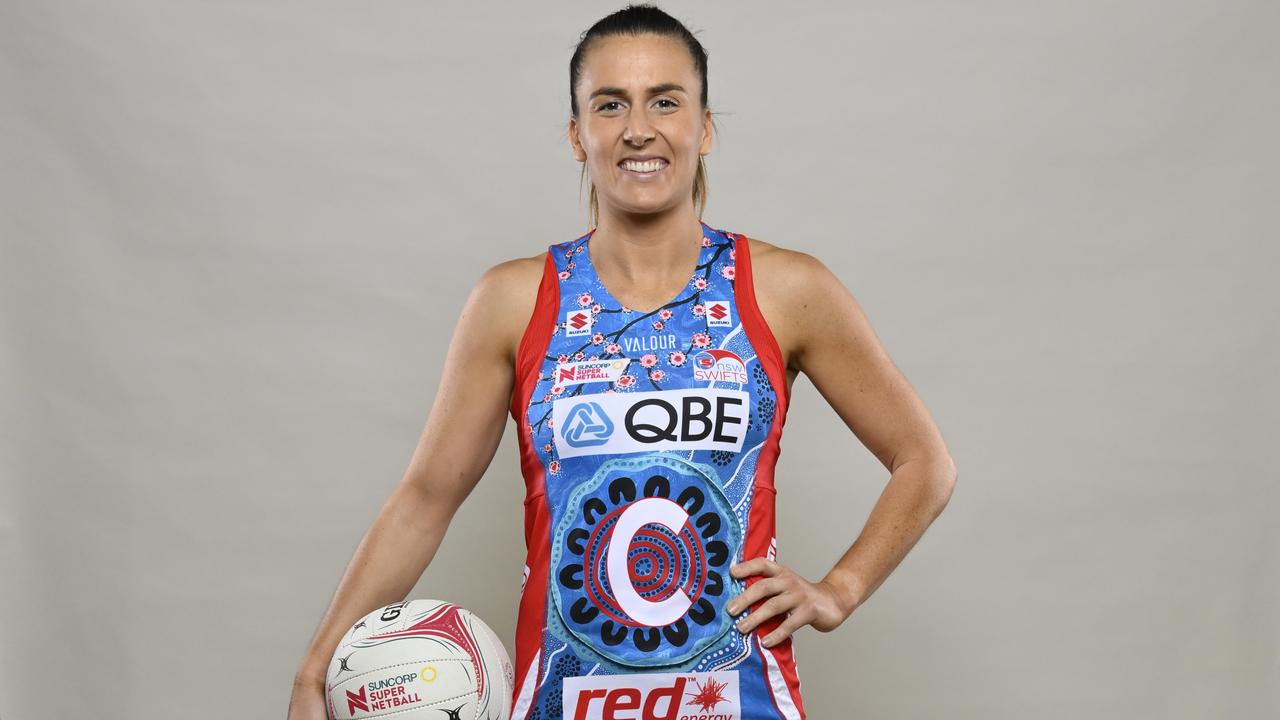 Swifts co-captain Maddy Proud models the club's First Nations round dress designed by Wongaibon woman and Netball NSW Premier League player Tarsha Hawley.