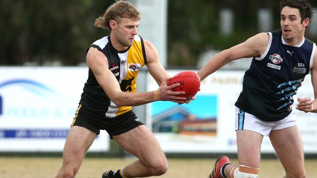 Chirnside Park defender Jimmy Wells was among the best on Sunday, the coach says. Photo: Hamish Blair