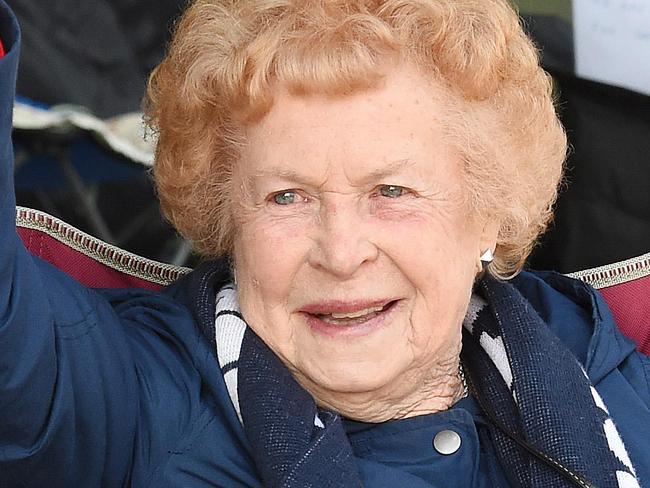 Joy Marchant 86yo first in the queue, she slept the night at the MCG to get a good seat. Joy has only missed 1 grand Final since 1945, that was because she had her twin daughters during the 1958 Grand Final.  Footy fans camp overnight at the MCG to get good seats for the AFL grand Final.  Picture: Nicole Garmston