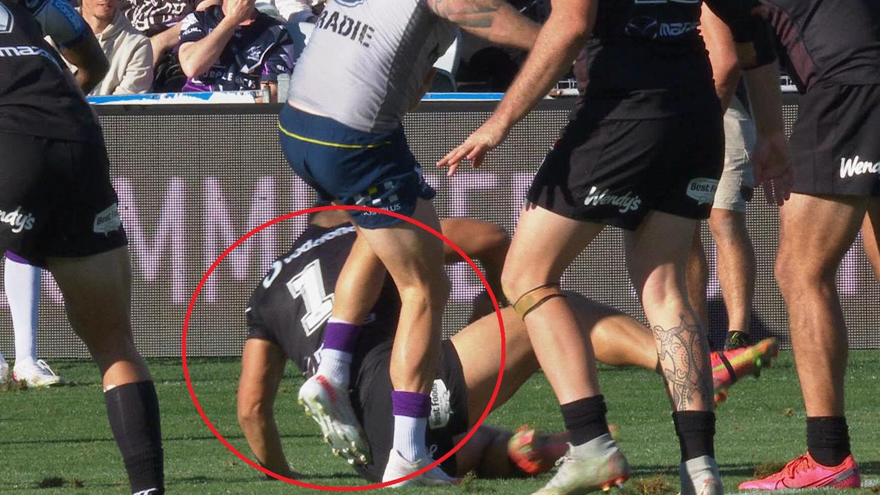 Cameron Munster kicks Roger Tuivasa-Sheck