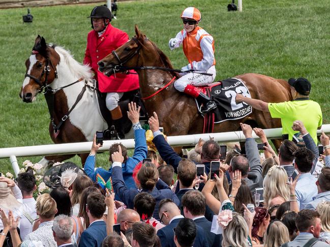 Melbourne Cup. Birdcage. Confidential. Craig Williams celebrates after riding Vow and Declare to victory in the 2019 Melbourne Cup. Picture: Jake Nowakowski