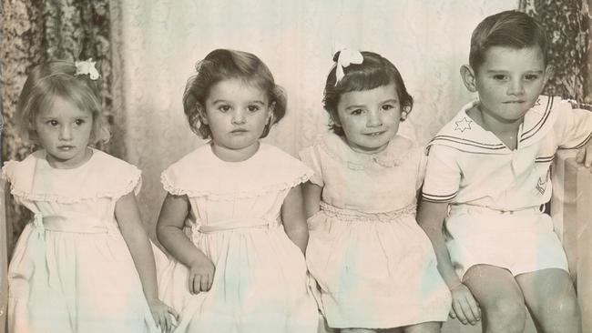 Gregory Smith and three of his sisters. ‘We may have presented well to the outside world but we were often black and blue’.