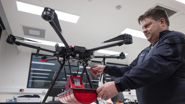 AFP experts with a drone at the Forensic Facility in Canberra. Picture: NCA NewsWire / Martin Ollman