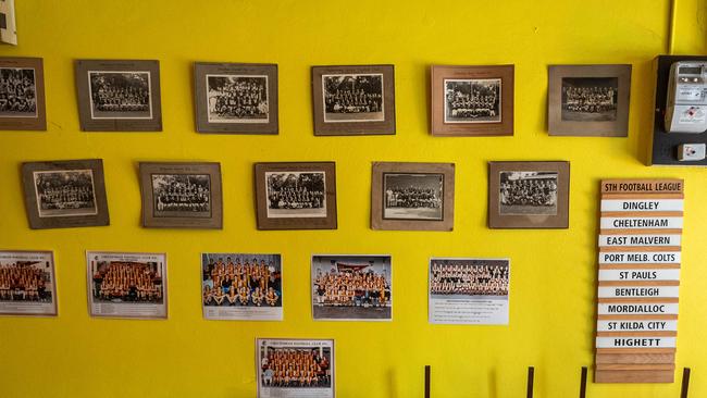 Old team photos from the local footy team line the walls at Sammy’s Barber Shop. Picture: Jake Nowakowski