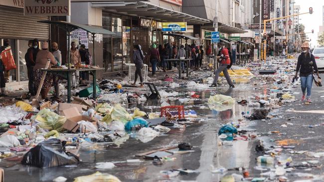 Shopkeepers count the cost after five days of looting and rioting in Durban, South Africa. Picture: AFP