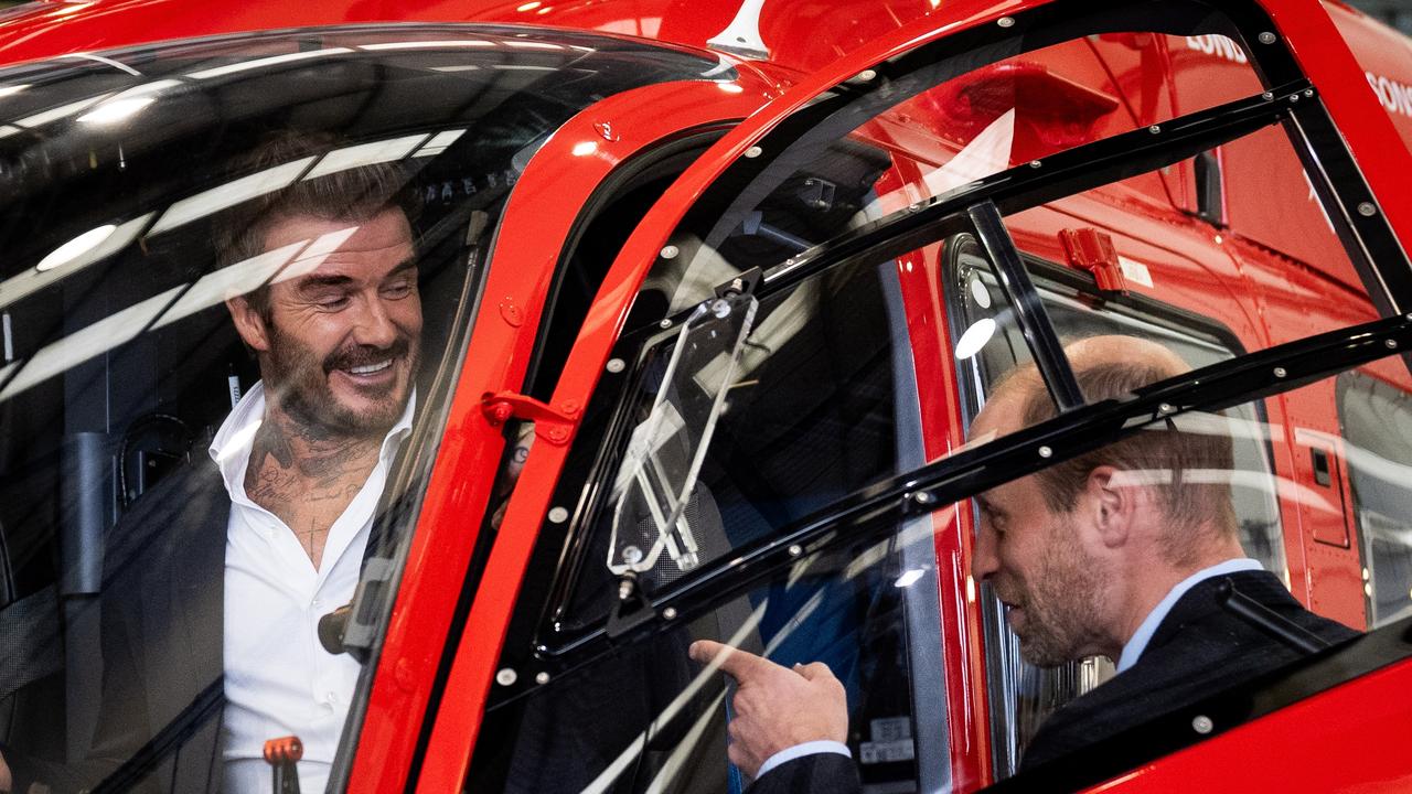 Prince William, Prince of Wales (left) with David Beckham viewing one of the new London Air Ambulance Charity helicopters. Picture: Getty