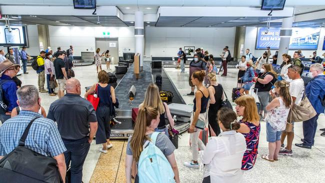 Passengers at Brisbane Airport after arriving from Sydney today. Picture: Richard Walker