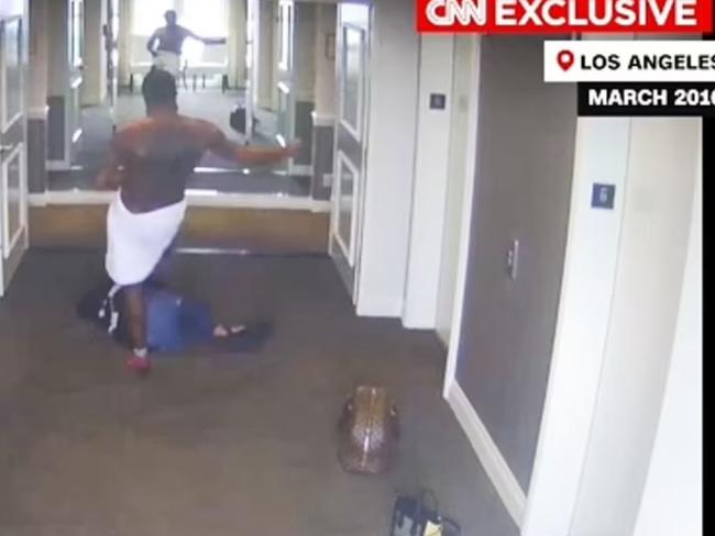 CCTV footage shows Sean Combs wrapped in a towel, kicking Cassie Ventura. Picture: Video grab / CNN