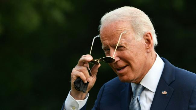 Joe Biden returns to the White House from Illinois. Picture: AFP