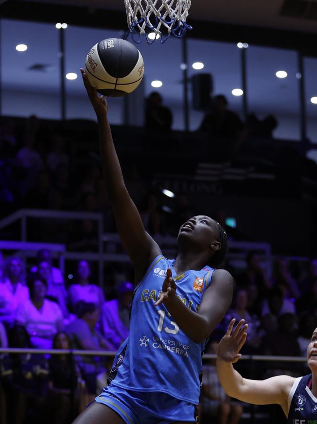 Nyadiew Puoch drives to the basket for Canberra. Picture: Darrian Traynor/Getty Images